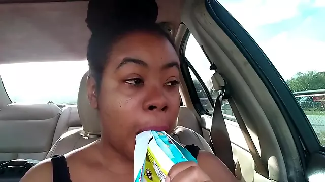 Ebony Big Lips Sucking Ice cream Pop Outside in Car - Cami Creams