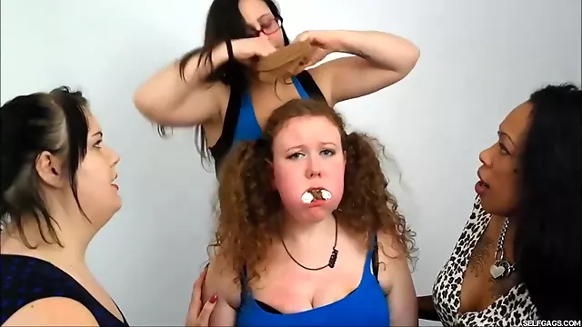 Thick Redheaded Bondage Slut Heavily Gagged By Three Lezdom Mistresses