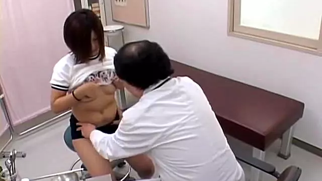 Japanese girl is examined by the gynecologist in spy video