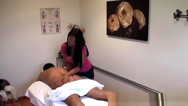 Chubby asian masseuse enjoys clients sperm