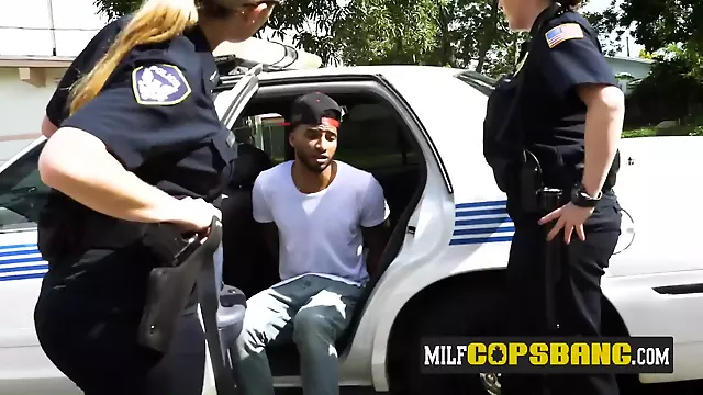 Scrawny thug is contrived by horny milf cops at their bunker