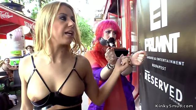 Mistress pisses redhead bitch in public
